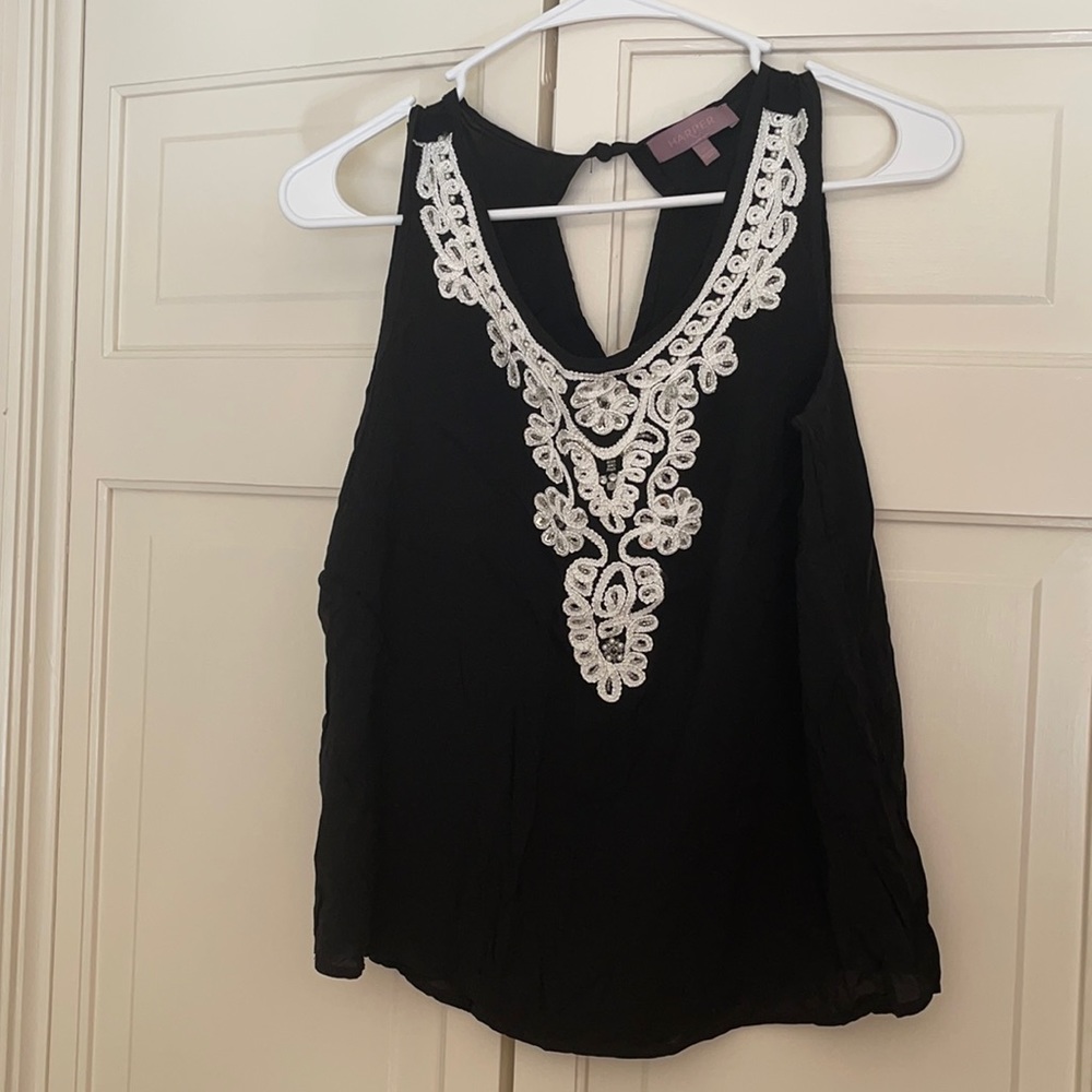 Black and white tank top. Worn few times.